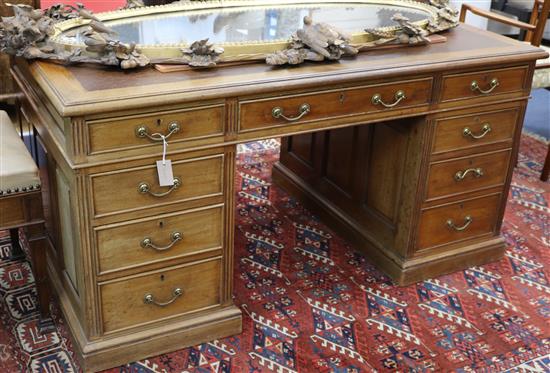 An Edwardian faded mahogany pedestal desk W.152cm